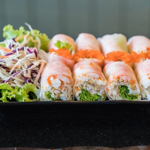 Salad roll vegetables with salad on the table